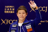 Billionaire Yusaku Maezawa attends a news conference after returning to Japan following a 12-day journey into space, in Tokyo, in January 2022. | Reuters