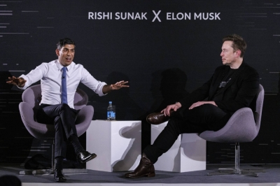 U.K. Prime Minister Rishi Sunak speaks with entrepreneur Elon Musk during a chat session on the rewards and risks of artificial intelligence in London, earlier this month.