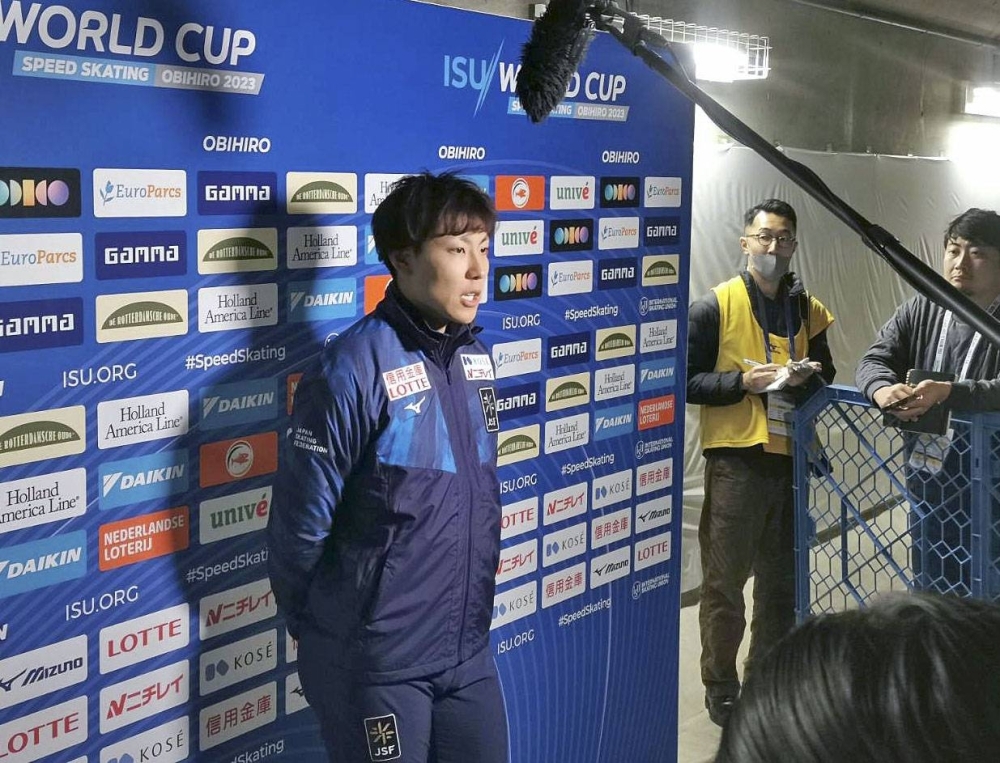 Tatsuya Shinhama speaks to the media after the men's 500 meters in Obihiro, Hokkaido, on Friday.