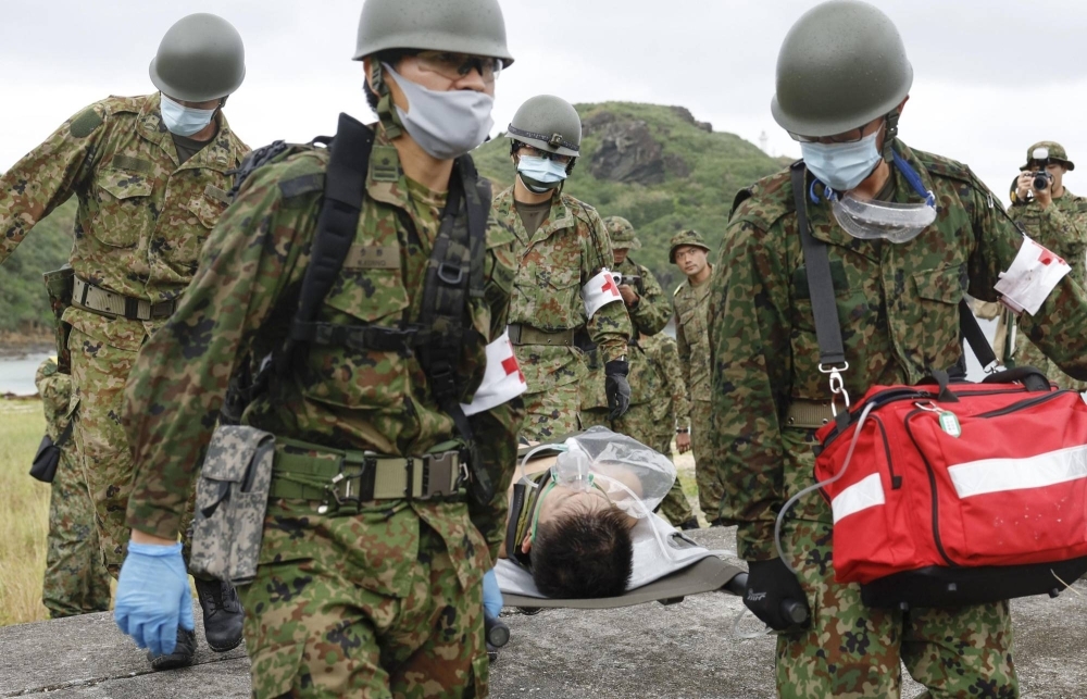Japan's Self-Defense Force on Sunday conducted a tsunami evacuation drill in Yonaguni, Japan's westernmost island, in Okinawa Prefecture.