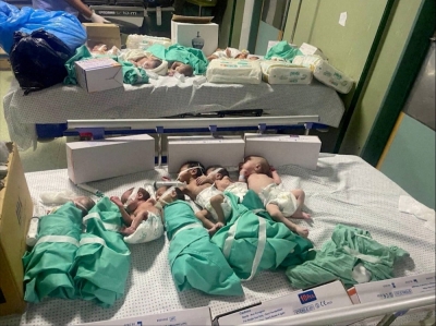 Newborns are placed in bed after being taken off incubators in Gaza's Shifa hospital after power outage, amid the ongoing conflict between Israel and the Palestinian Islamist group Hamas, in Gaza City on Sunday.