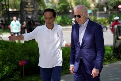 Indonesian President Joko Widodo walks with U.S. President Joe Biden on the sidelines of the G20 summit in Denpasar, Bali, Indonesia, on Nov. 16, 2022.