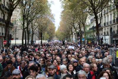 People attend a demonstration against antisemitism on Sunday as antisemitic offenses surged in in France.