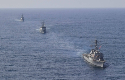 U.S., Japanese and South Korean navy destroyers take part in joint missile defense exercises in international waters between South Korea and Japan in April. 