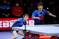 Hina Hayata (left) and Tomokazu Harimoto of Japan compete in a mixed doubles semifinal during the 2021 World Table Tennis Championships in Houston in November 2021. | USA TODAY Sports / Reuters