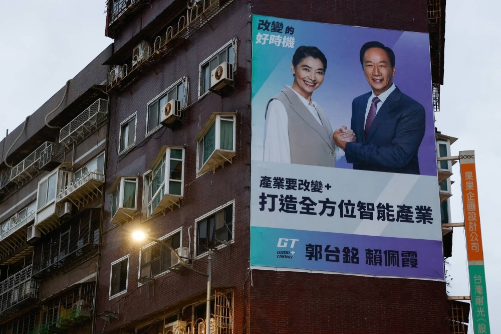 A poster of Terry Gou, who has collected three times the amount of signatures needed to qualify to run Taiwan's presidential elections is displayed in Taipei on Tuesday.