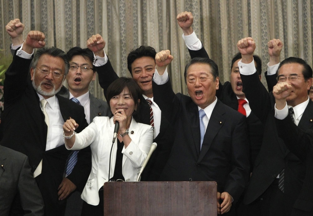 Ichiro Ozawa (third from right) with other members of parliament at a ceremony to launch a new party in Tokyo in July 2012.