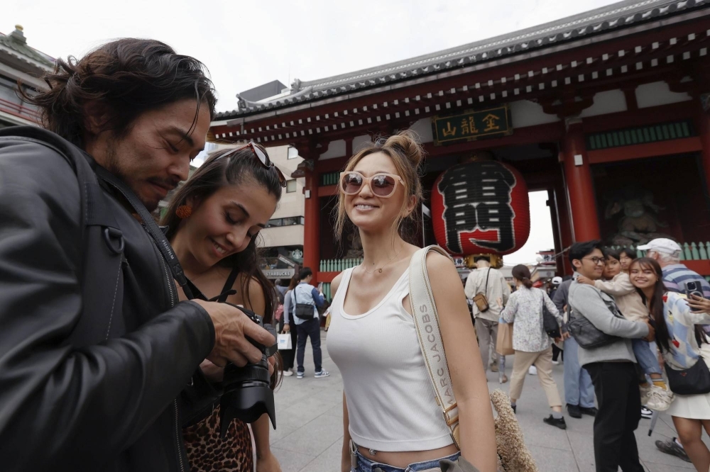 Tourists in Tokyo's Asakusa district earlier this month