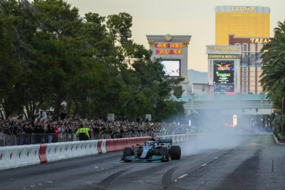 Mercedes driver George Russell drives during the Formula One Las Vegas Grand Prix Launch Party in November 2022. 