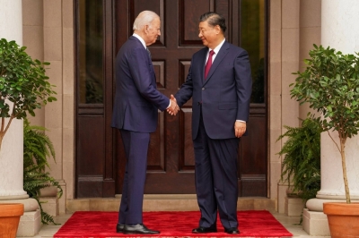 U.S. President Joe Biden shakes hands with Chinese leader Xi Jinping at Filoli estate in Woodside, California, on Wednesday.