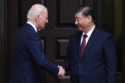 U.S. President Joe Biden greets Chinese President Xi Jinping before a meeting during the Asia-Pacific Economic Cooperation leaders week in Woodside, California, on Wednesday.