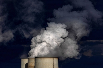 Cooling towers at a coal-fired power plant in Germany. While surface temperatures might stabilize quickly after reaching net-zero, other shifting parts of the climate are harder to slow once set in motion.