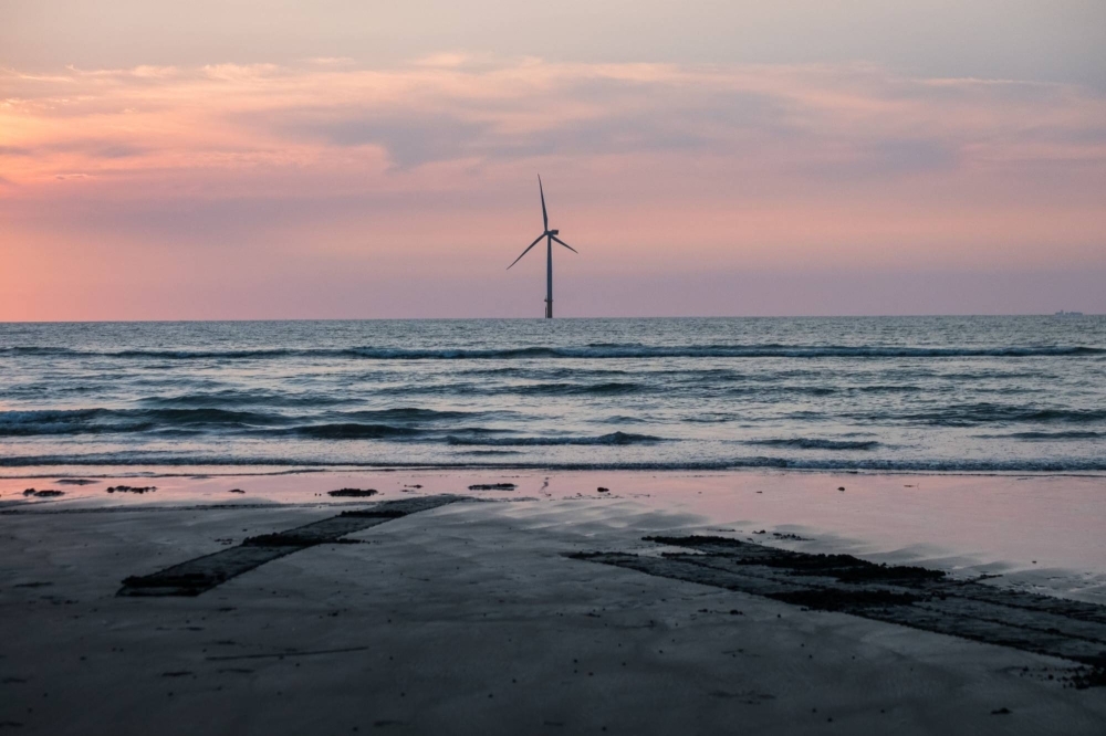 An offshore wind turbine, operated by Swancor Holding stands in the Taiwan Strait off the coast of Miaoli County, Taiwan, in 2018.