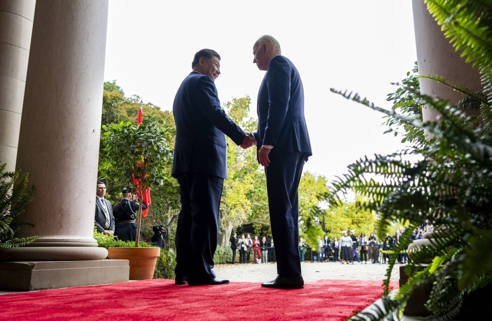 U.S. President Joe Biden greets his Chinese counterpart, Xi Jinping, in Woodside, California, on Wednesday during the Asia-Pacific Economic Cooperation summit.
