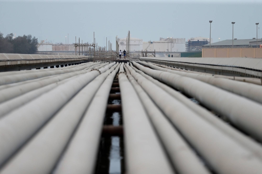 Petroleum pipelines and fuel storage tanks at a refinery near Manama, Bahrain, in 2017