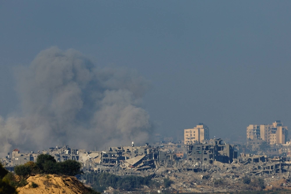 Smoke rises from Gaza amid the Israel-Hamas war on Saturday. 