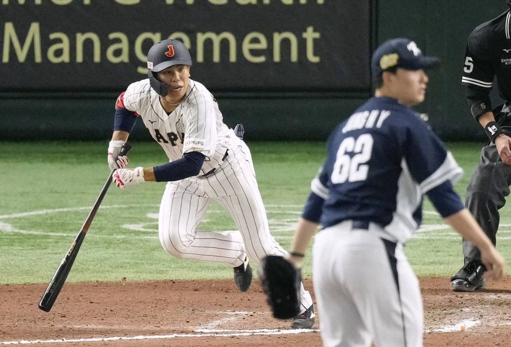 Makoto Kadowaki lifted Japan over South Korea with a walk-off single in the 10th inning at Tokyo Dome on Sunday.