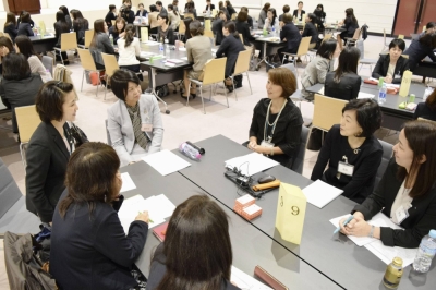 Female managers of Mitsui Sumitomo Insurance take part in a training session in Tokyo in October 2018.