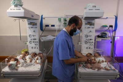 A Palestinian medic cares for premature babies evacuated from Shifa hospital to the Emirates hospital in Rafah in the southern Gaza Strip on Sunday.