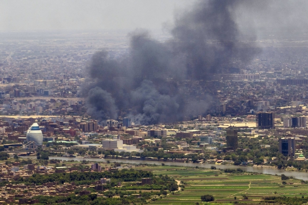 Smoke rises during fighting in the Sudanese capital Khartoum on May 3.