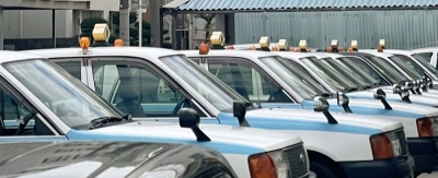 Cabs not in operation are parked at a taxi company in Naha in October. Finding a taxi in parts of Okinawa Prefecture is becoming increasingly difficult because of a shortage of drivers.