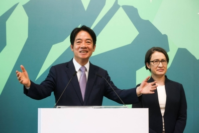 Lai Ching-te (left), Taiwanese presidential candidate from the Democratic Progressive Party, introduces Hsiao Bi-khim (right), former Taiwan representative to the United States, as his running mate in the 2024 election, during a news conference at Lai's campaign headquarters in Taipei on Monday.