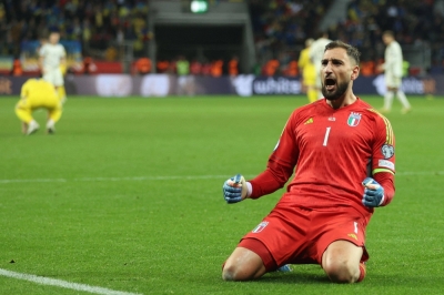 Italy goalkeeper Gianluigi Donnarumma celebrates at the final whistle of the Euro 2024 Group C qualifying match between Ukraine and Italy at the BayArena Stadium in Leverkusen, Germany, on Monday.