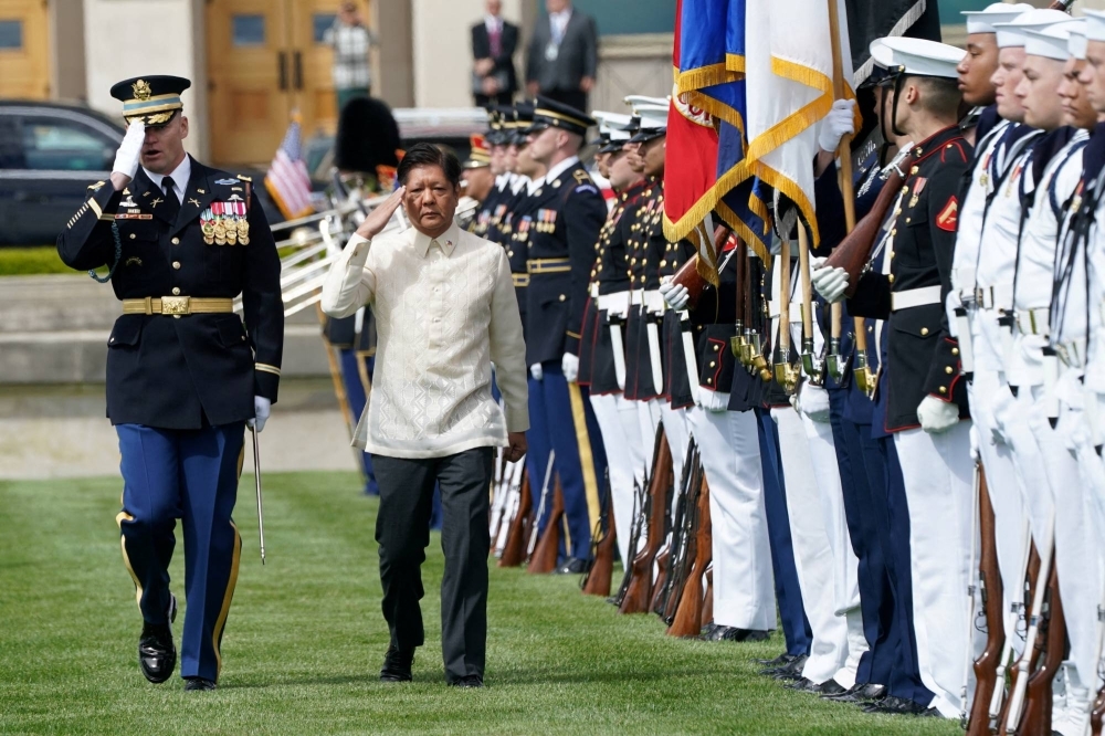 Philippine President Ferdinand Marcos Jr. reviews a military honor guard during a full honors arrival ceremony at the Pentagon in Washington on May 3. 