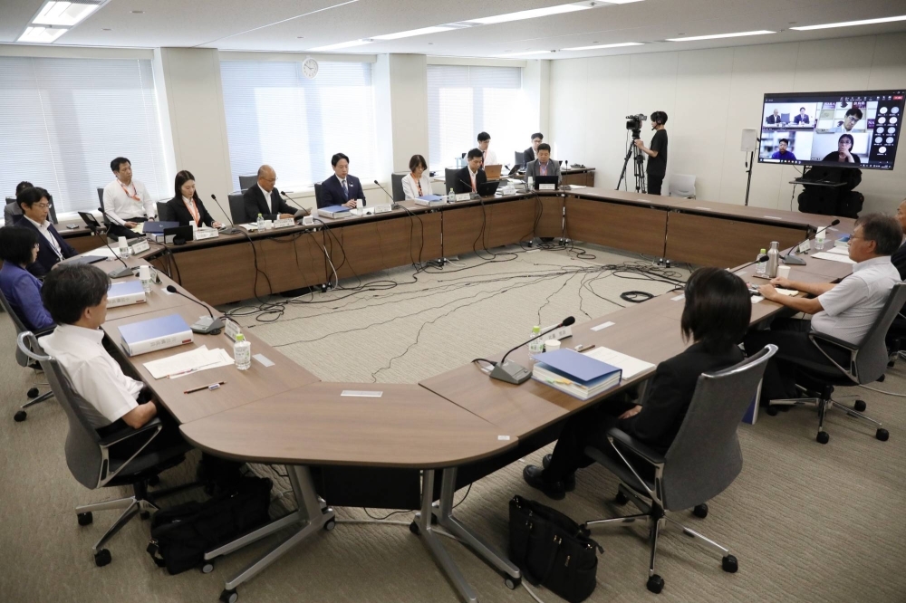 Experts discuss the planned the planned database of sex offense records, at the Children and Families Agency in Tokyo on Sept. 5.