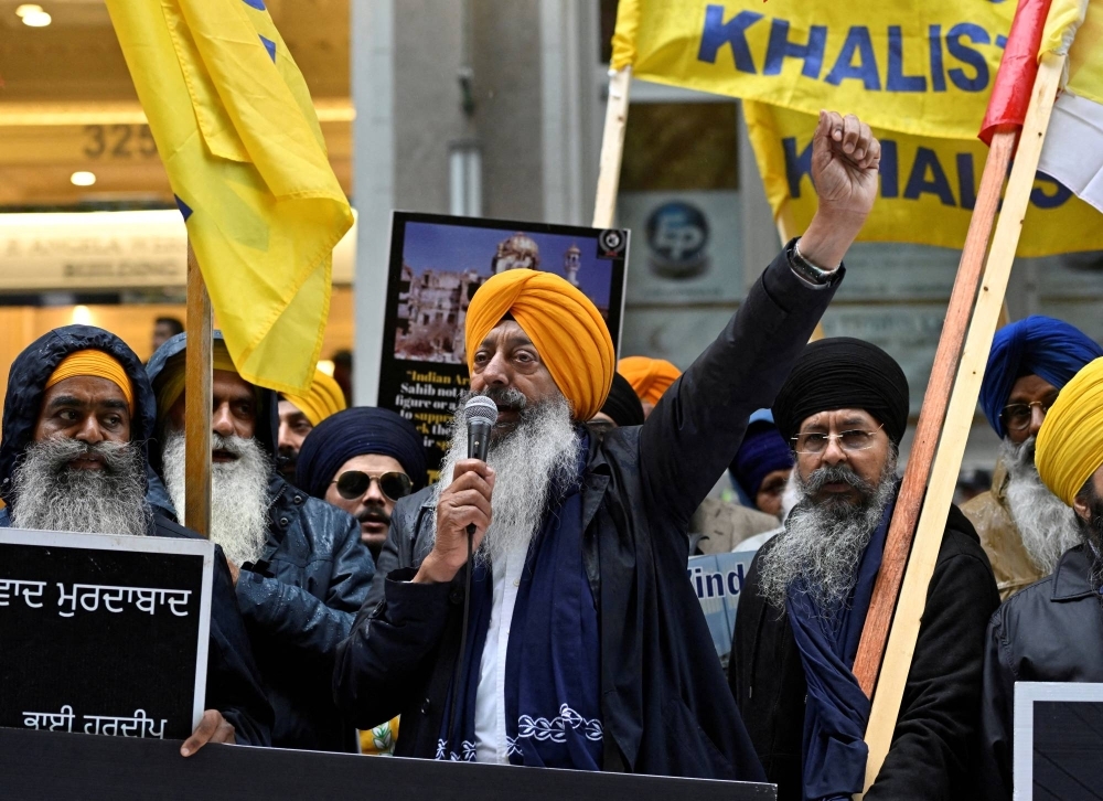 Demonstrators protest outside an Indian consulate in Canada on Sept. 25 after Canadian Prime Minister Justin Trudeau raised the prospect of New Delhi's involvement in the murder of a Sikh separatist leader there. Now U.S. officials say they have thwarted a similar plot.