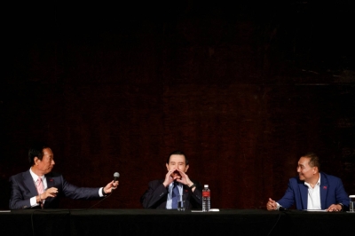 Terry Gou, Foxconn founder and then-presidential candidate (left), former Taiwan President Ma Ying-jeou (center), Hou Yu-ih presidential candidate of the main opposition Kuomintang attend a news conference in Taipei on Thursday. 