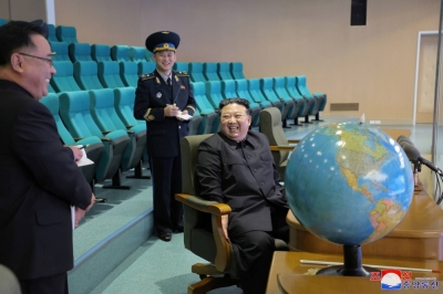 North Korean leader Kim Jong Un visits the control center of the National Aerospace Technology Administration in Pyongyang to inspect the operational readiness of a new military spy satellite and view photographs in this image released Saturday. 
