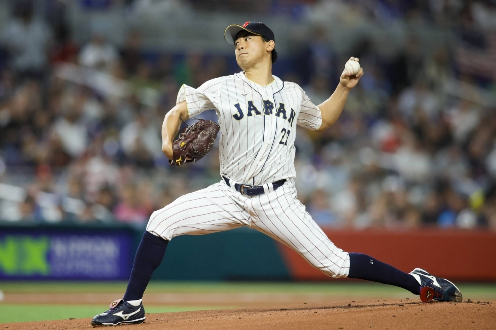 Shota Imanaga pitches for Japan during the World Baseball Classic final in Miami on March 21.