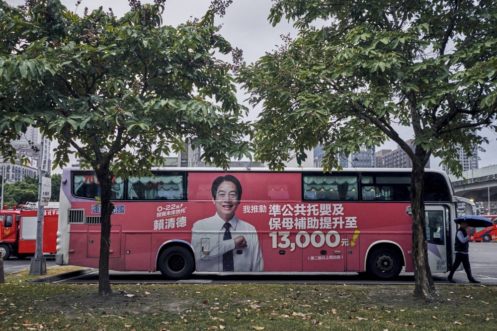 An advertisement for Lai Ching-te, whose presidential campaign was the target of an audio deepfake, in Taipei on Nov. 14. Ahead of a presidential election in January, Taiwanese fact checkers and watchdogs say they are ready for Beijing. But they are still worried. 