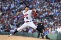 Kenta Maeda pitches for the Twins in the playoffs against the Astros in October. Maeda has signed a two-year deal with the division rival Tigers.  | USA TODAY / via Reuters 