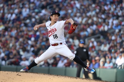 Kenta Maeda pitches for the Twins in the playoffs against the Astros in October. Maeda has signed a two-year deal with the division rival Tigers. 