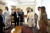 Pope Francis meets Nobel physics laureate Giorgio Parisi and the other speakers of the 'Laudate Deum: voices and testimonies on the climate crisis' conference at the Vatican on Oct. 5. | REUTERS