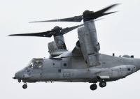 A U.S. military Osprey tilt-rotor aircraft takes off from U.S. military port facilities in Naha in March. | Kyodo
