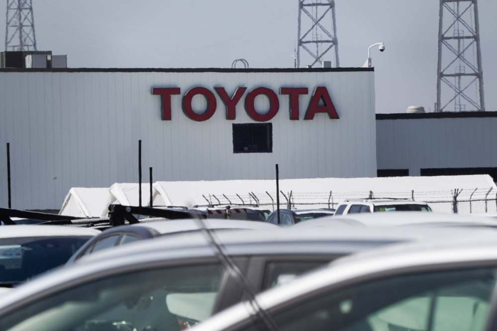 Toyota posted record October global sales and production on strong demand for its cars in North America and Europe.