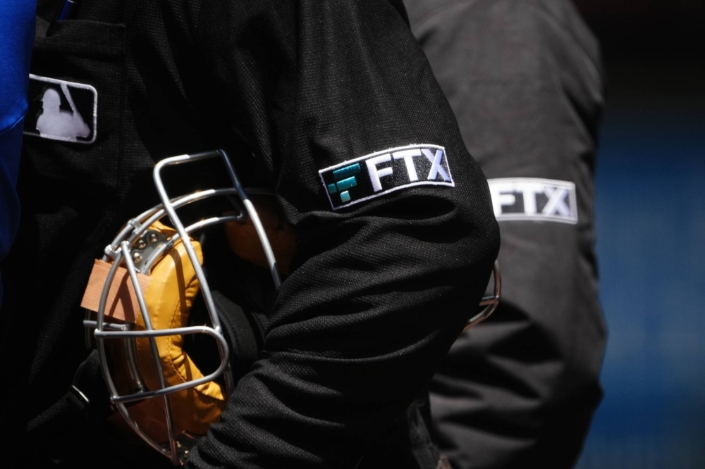 In 2022, MLB umpires wore FTX patches on their sleeves.