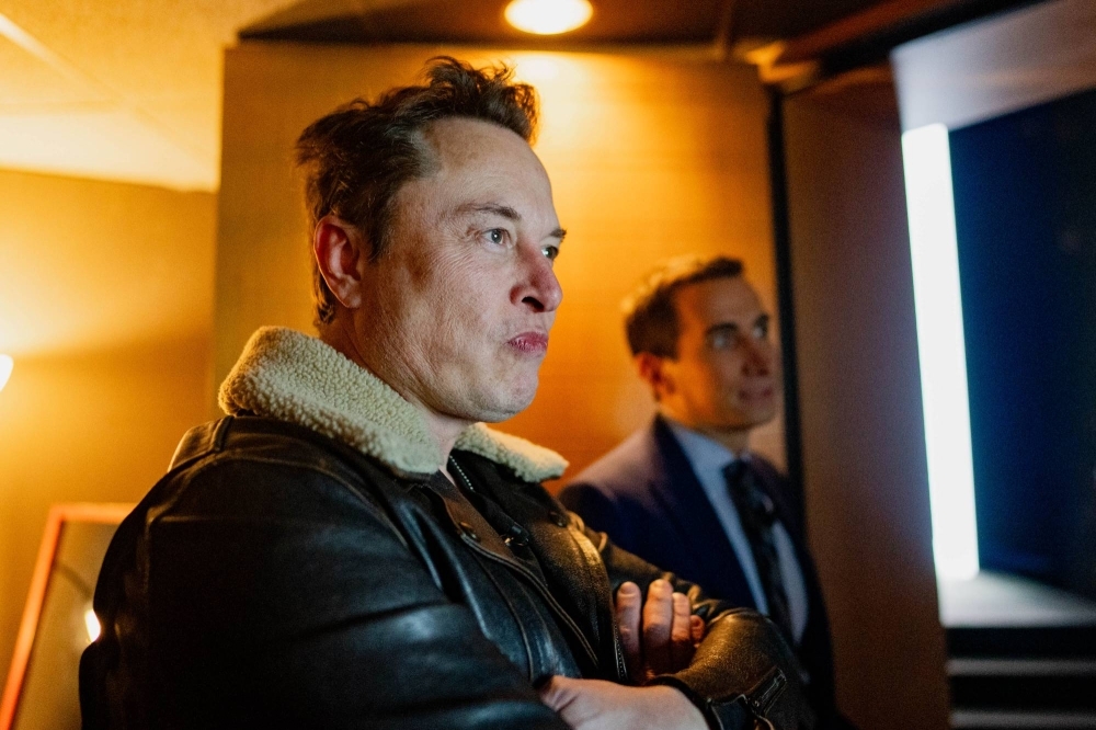 Elon Musk waits backstage before being interviewed at the 2023 New York Times DealBook Summit in New York on Wednesday.