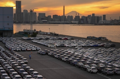 Strong shipments of cars, especially to the U.S., helped push up Japan’s industrial production more than expected in October.