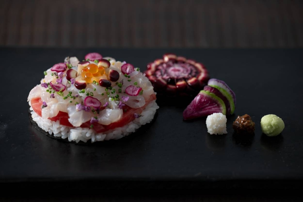 Inspired by the annual display of ancient artifacts from Nara’s Shosoin repository, chef Nishihara’s take on 'chirashi-zushi' depicts the design on a bronze mirror dating back some 1,300 years.