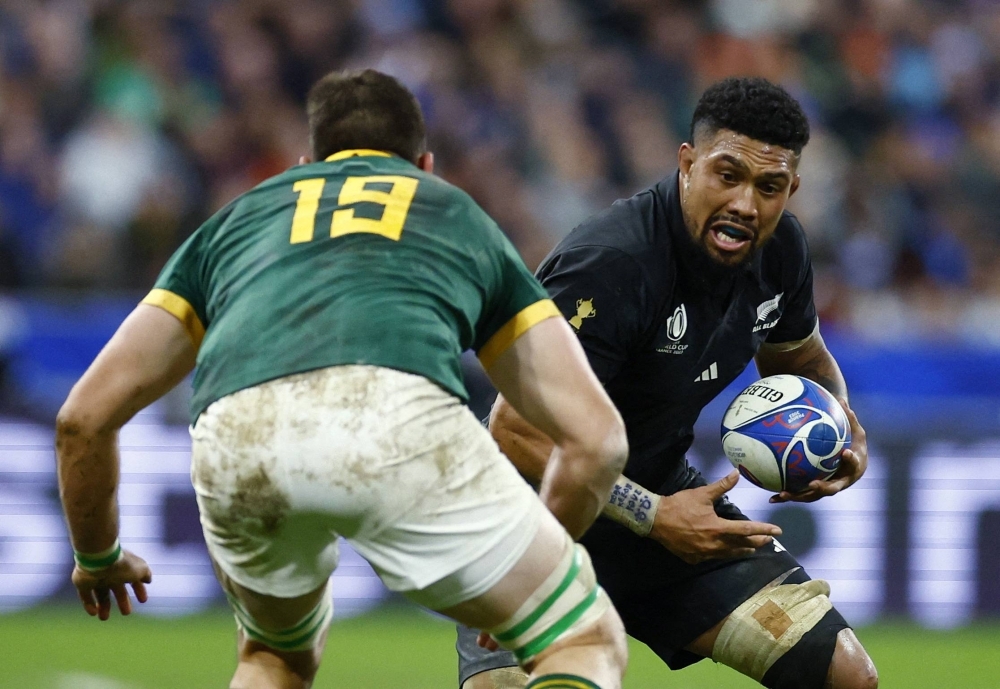 New Zealand's Ardie Savea (right) in action with South Africa's Jean Kleyn at the Stade de France in Saint-Denis, France, on Oct. 28