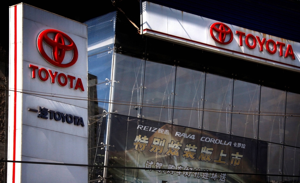 A sign is seen outside a Tianjin Faw Toyota Motor showroom, a joint venture between China's Tianjin FAW Xiali Automobile and Toyota Motor, in central Beijing, in October 2012.