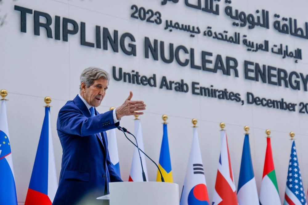 U.S. climate envoy John Kerry speaks during a session at COP28 on Saturday where over 20 nations called for the tripling of nuclear energy by 2050. 
