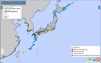 Areas highlighted in yellow indicate regions covered by the tsunami advisory.