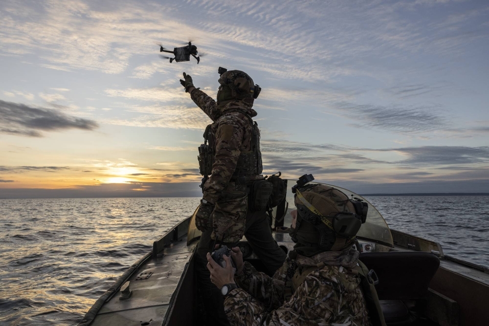 A Ukrainian special forces unit operates a surveillance drone on the Dnieper River on Oct. 22, 2022. 