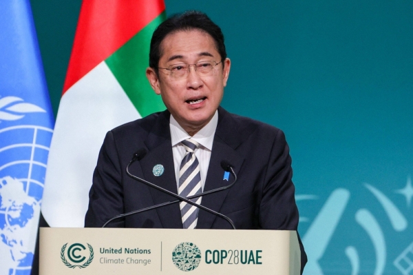 Prime Minister Fumio Kishida speaks during a session at the United Nations climate summit in Dubai on Friday.