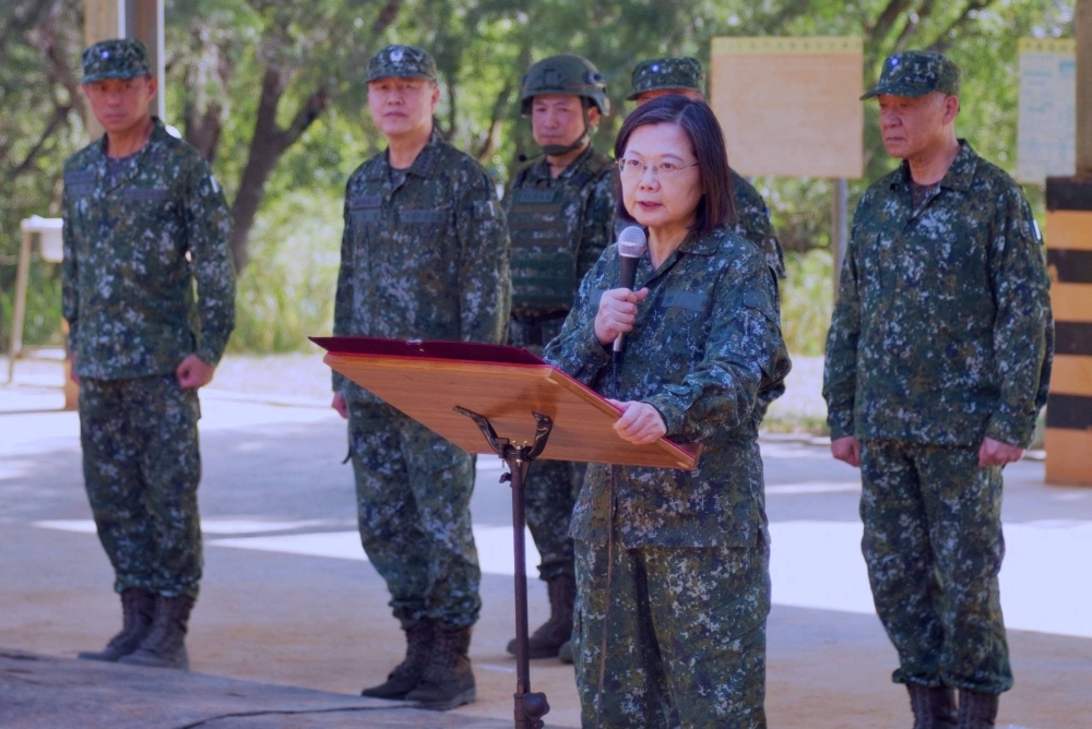 Taiwan President Tsai Ing-wen speaks to compulsory servicemen while inspecting a military base in Taichung on Nov. 23. Tsai is barred by term limits from seeking re-election.
